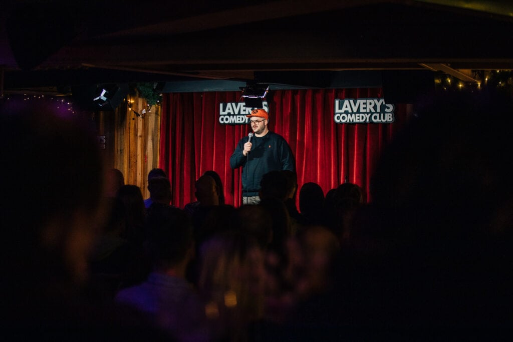Colin Geddis on stage in the Comedy Club