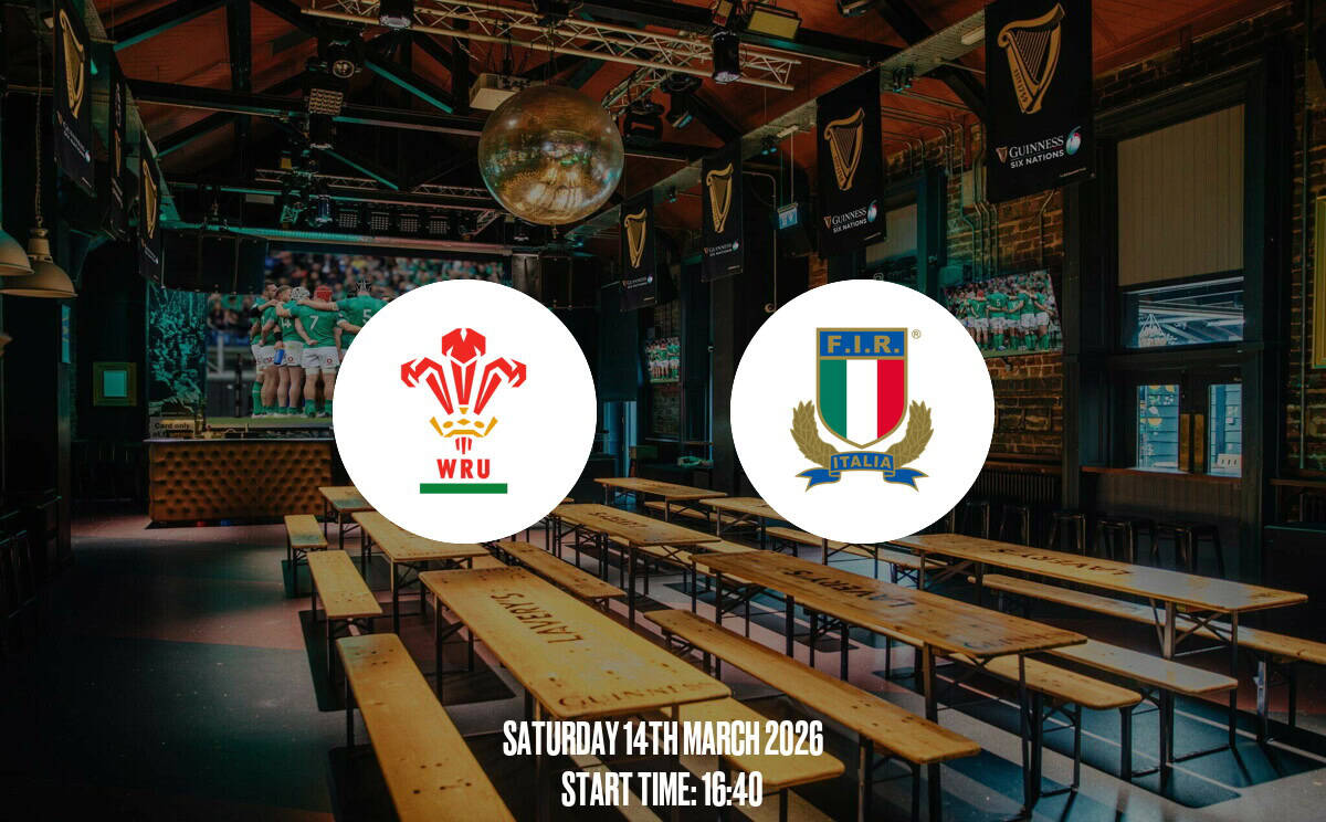 A vibrant pub interior with rugby match on large screens, featuring Welsh and Italian rugby team logos, wooden benches, and lively atmosphere, perfect for sports fans.