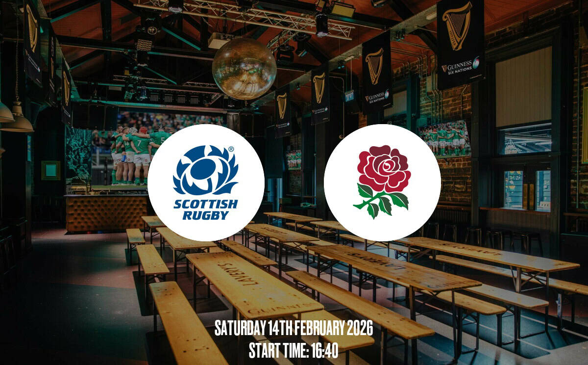 A lively Scottish rugby viewing event at Lavery's Irish pub featuring branded banners and rugby screens, ideal for fans large indoor space with wooden benches and vibrant atmosphere.