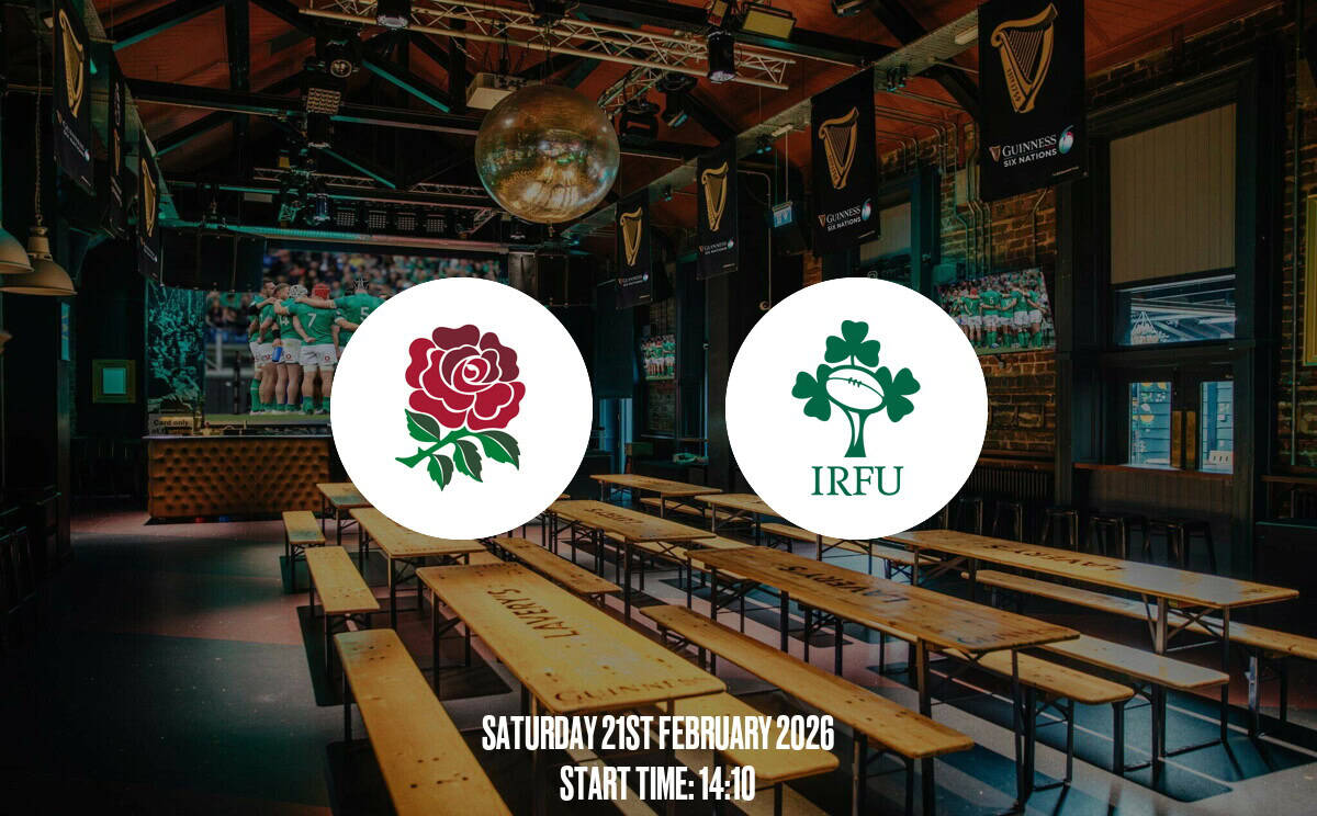 A vibrant Irish sports bar with large screens showcasing rugby matches, wooden benches, and Guinness-themed decor, perfect for watching rugby games in a lively atmosphere.