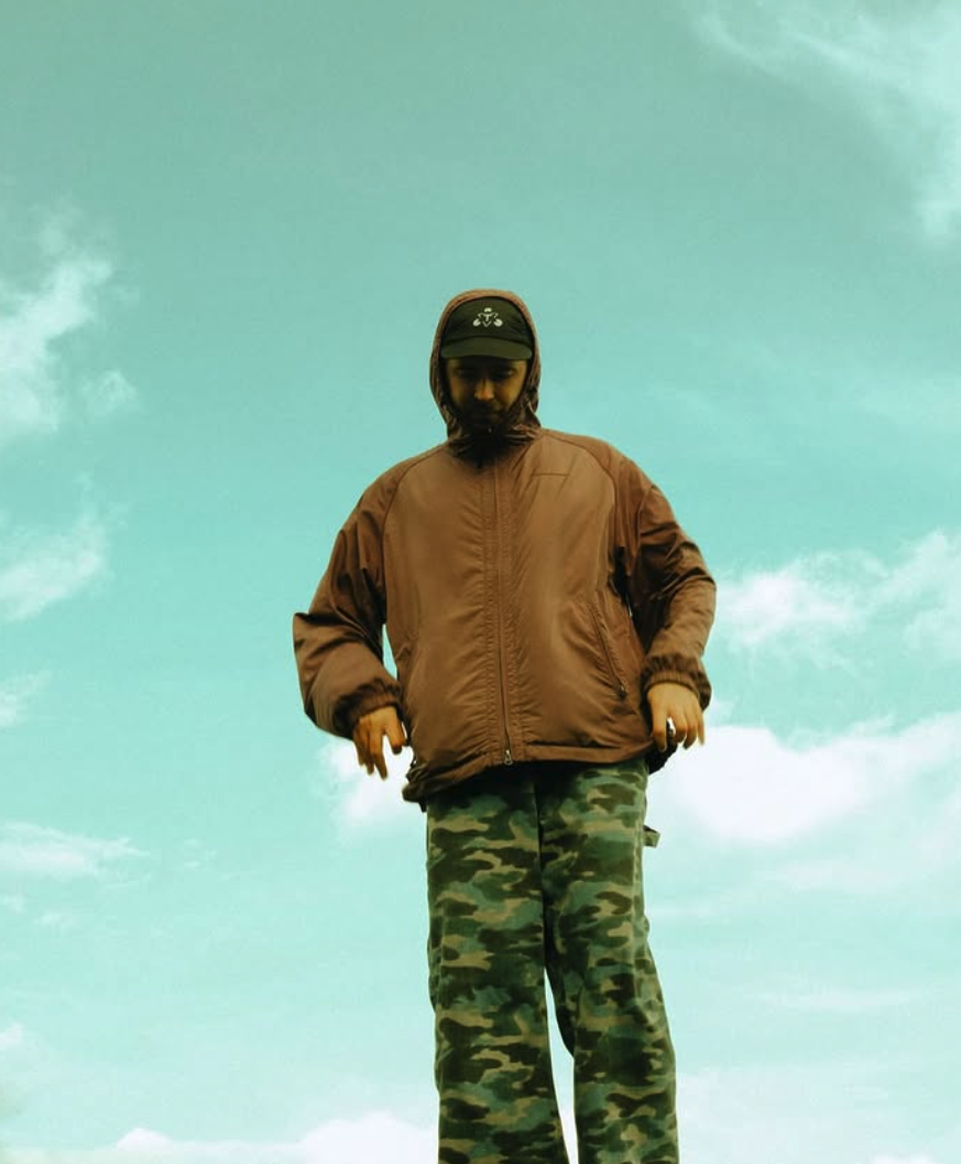 Resident Dj Andrew Moore At Lavery'S, Mixing Music In A Vibrant Club Setting, Showcasing His Dj Skills And Energetic Presence.